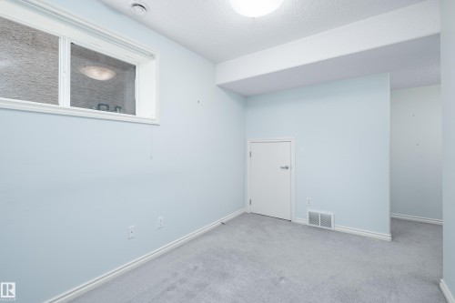 #40 1251 Rutherford Rd Sw, Edmonton, AB - Indoor Photo Showing Other Room