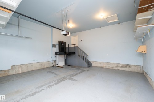#40 1251 Rutherford Rd Sw, Edmonton, AB - Indoor Photo Showing Garage