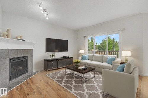 66 Vanessa Avenue, Spruce Grove, AB - Indoor Photo Showing Living Room With Fireplace