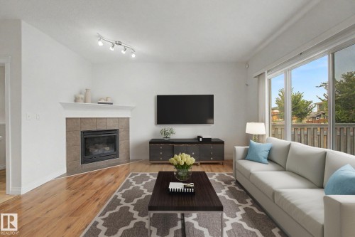 66 Vanessa Avenue, Spruce Grove, AB - Indoor Photo Showing Living Room With Fireplace