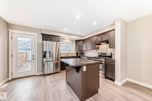 5709 66 Street, Beaumont, AB - Indoor Photo Showing Kitchen With Stainless Steel Kitchen With Double Sink