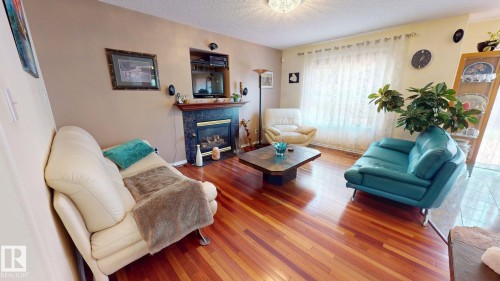 4 Oakland Way, St. Albert, AB - Indoor Photo Showing Living Room With Fireplace