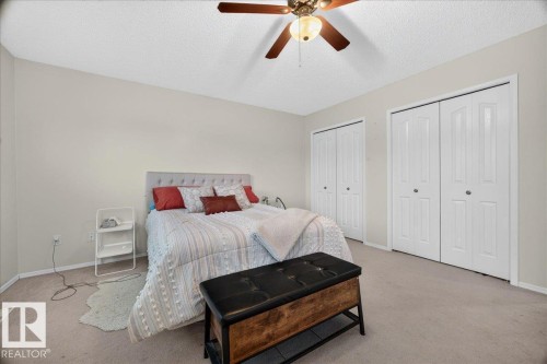 Bedroom with light-colored carpeting and neutral painted walls - 6 Norfolk Close, St. Albert, AB - Indoor Photo Showing Bedroom