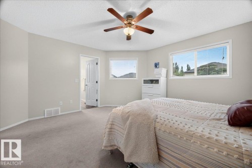 Interior room with neutral wall tones and carpet flooring - 6 Norfolk Close, St. Albert, AB - Indoor Photo Showing Bedroom