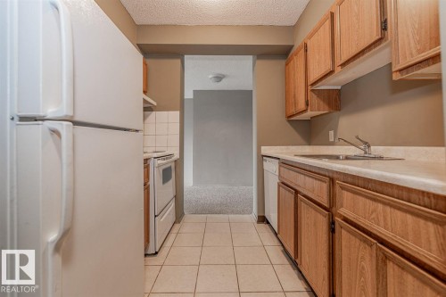 #607 12841 65 St Nw, Edmonton, AB - Indoor Photo Showing Kitchen