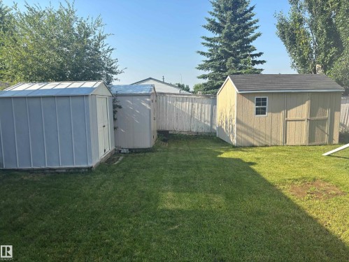 A total of 3 sheds included in the sale - 20 Sunset Boulevard, Spruce Grove, AB - Outdoor With Backyard