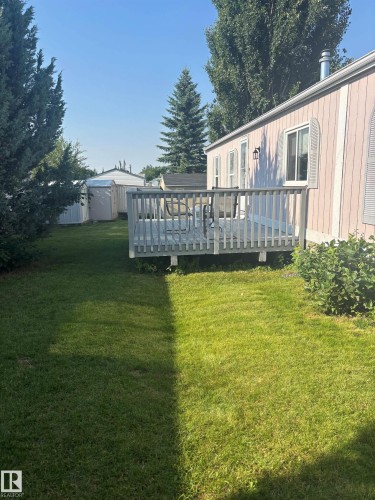 Freshly painted deck for outdoor enjoyment - 20 Sunset Boulevard, Spruce Grove, AB - Outdoor With Deck Patio Veranda