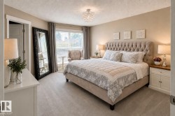 Wall-to-wall carpeting and neutral wall tones define this space - 