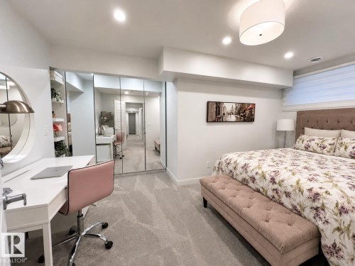 Recessed lighting illuminating plush carpet flooring - 2337 Frezenberg Avenue Nw, Edmonton, AB - Indoor Photo Showing Bedroom