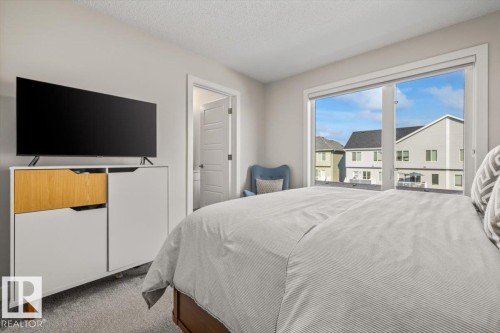 #30 11910 35 Av Sw, Edmonton, AB - Indoor Photo Showing Bedroom