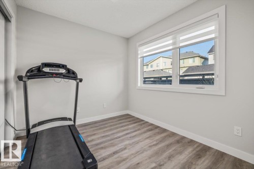 #30 11910 35 Av Sw, Edmonton, AB - Indoor Photo Showing Gym Room