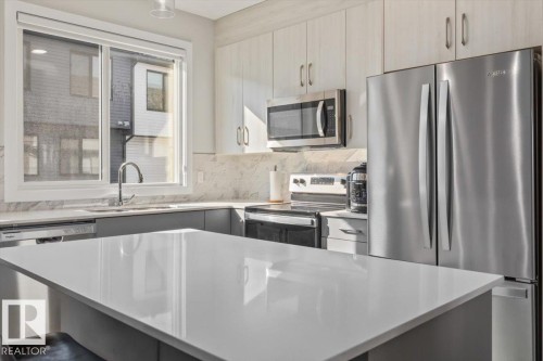 #30 11910 35 Av Sw, Edmonton, AB - Indoor Photo Showing Kitchen With Double Sink With Upgraded Kitchen