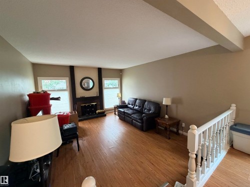 18 Latimer Place, St. Albert, AB - Indoor Photo Showing Other Room With Fireplace