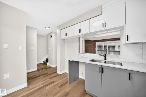 5535 144A Avenue Nw, Edmonton, AB - Indoor Photo Showing Kitchen With Double Sink