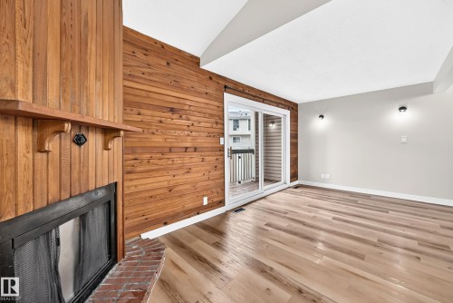 5535 144A Avenue Nw, Edmonton, AB - Indoor Photo Showing Other Room With Fireplace