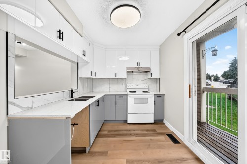 5535 144A Avenue Nw, Edmonton, AB - Indoor Photo Showing Kitchen With Double Sink
