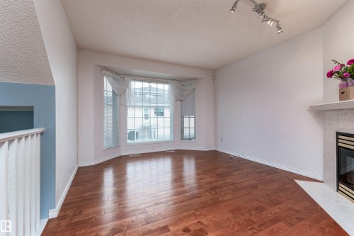 #22 11105 9 Av Nw, Edmonton, AB - Indoor Photo Showing Other Room With Fireplace