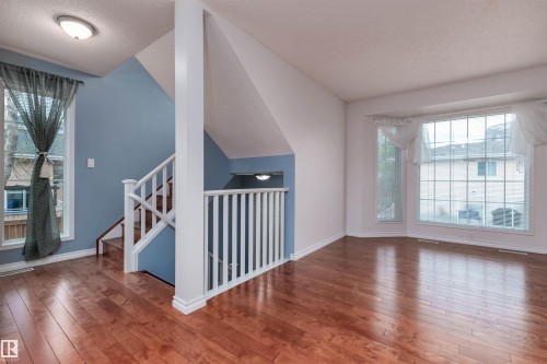 #22 11105 9 Av Nw, Edmonton, AB - Indoor Photo Showing Other Room With Fireplace