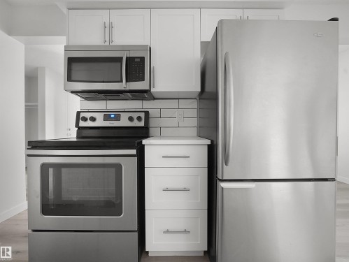 #6 14220 80 St Nw, Edmonton, AB - Indoor Photo Showing Kitchen