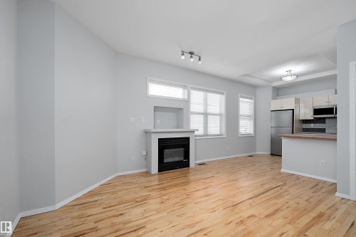 #108 10933 82 Av Nw, Edmonton, AB - Indoor With Fireplace