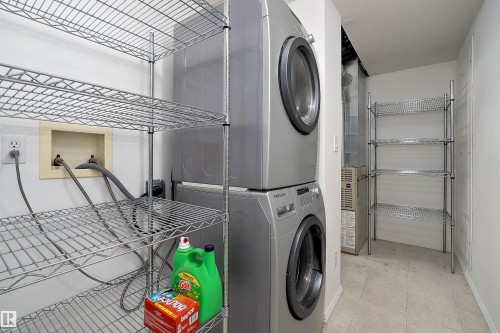 With extra storage & second entrance to the left - #108 10933 82 Av Nw, Edmonton, AB - Indoor Photo Showing Laundry Room