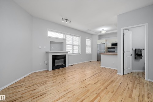Main Floor - #108 10933 82 Av Nw, Edmonton, AB - Indoor With Fireplace