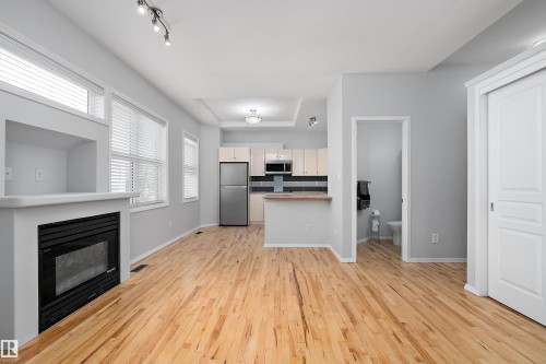 #108 10933 82 Av Nw, Edmonton, AB - Indoor With Fireplace