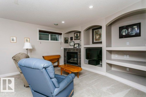 96 Eastgate Way, St. Albert, AB - Indoor Photo Showing Living Room With Fireplace