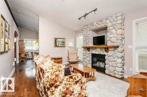96 Eastgate Way, St. Albert, AB - Indoor Photo Showing Living Room With Fireplace