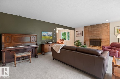 12636 52 Avenue Nw, Edmonton, AB - Indoor Photo Showing Living Room With Fireplace