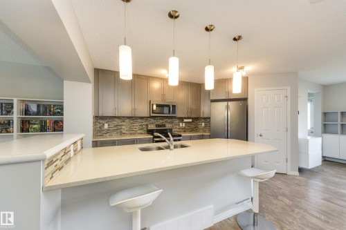 1241 Chappelle Boulevard Sw, Edmonton, AB - Indoor Photo Showing Kitchen With Double Sink With Upgraded Kitchen