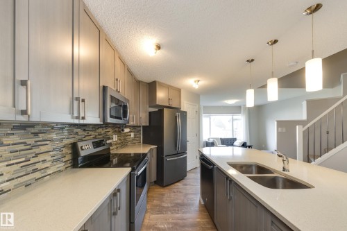 1241 Chappelle Boulevard Sw, Edmonton, AB - Indoor Photo Showing Kitchen With Double Sink With Upgraded Kitchen