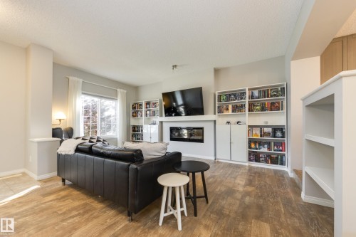 1241 Chappelle Boulevard Sw, Edmonton, AB - Indoor Photo Showing Living Room With Fireplace