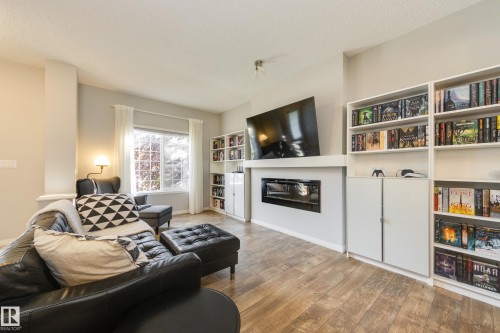 1241 Chappelle Boulevard Sw, Edmonton, AB - Indoor Photo Showing Living Room With Fireplace