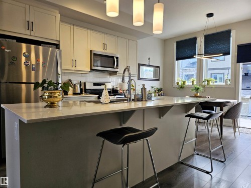 #128 1304 Rutherford Rd Sw Sw, Edmonton, AB - Indoor Photo Showing Kitchen With Stainless Steel Kitchen With Upgraded Kitchen