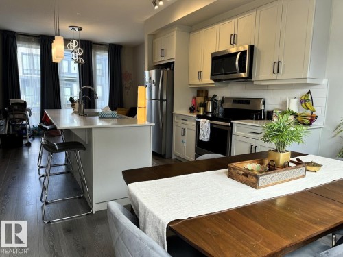 #128 1304 Rutherford Rd Sw Sw, Edmonton, AB - Indoor Photo Showing Kitchen With Stainless Steel Kitchen