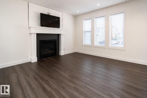 8916 217 Street Nw, Edmonton, AB - Indoor Photo Showing Living Room With Fireplace