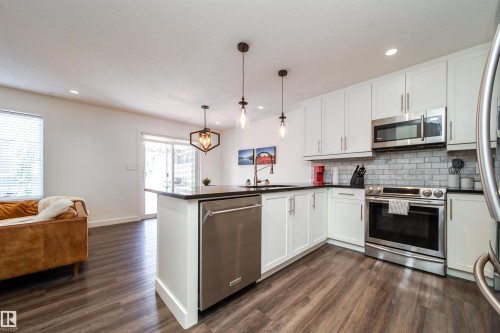8916 217 Street Nw, Edmonton, AB - Indoor Photo Showing Kitchen With Stainless Steel Kitchen With Upgraded Kitchen