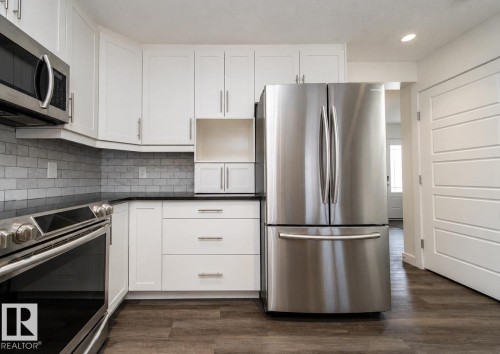 8916 217 Street Nw, Edmonton, AB - Indoor Photo Showing Kitchen With Stainless Steel Kitchen