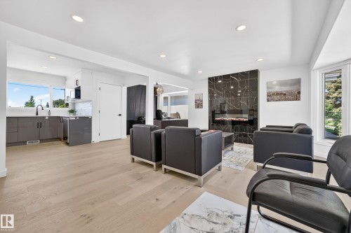 6011 93A Avenue Nw, Edmonton, AB - Indoor Photo Showing Living Room With Fireplace