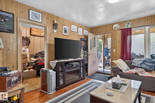 4711 50 Street, Onoway, AB - Indoor Photo Showing Living Room With Fireplace