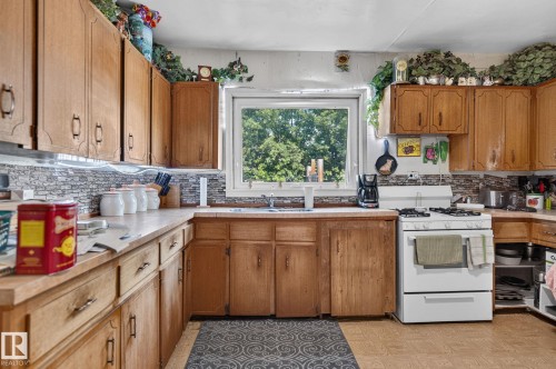 4711 50 Street, Onoway, AB - Indoor Photo Showing Kitchen With Double Sink
