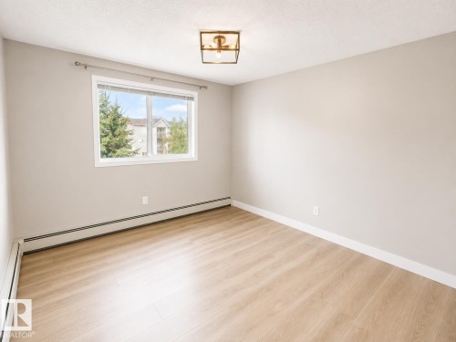 #329 17447 98A Av Nw, Edmonton, AB - Indoor Photo Showing Other Room