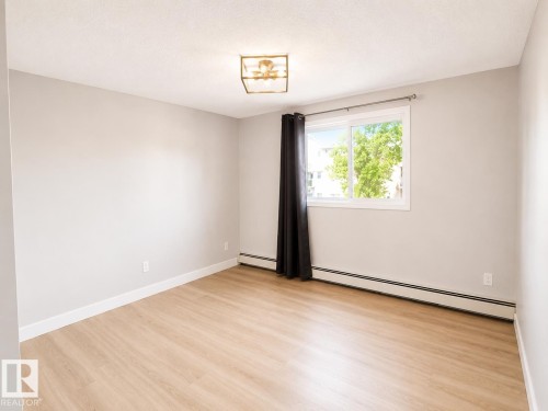 #329 17447 98A Av Nw, Edmonton, AB - Indoor Photo Showing Other Room