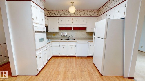3536 105A Street Nw, Edmonton, AB - Indoor Photo Showing Kitchen With Double Sink