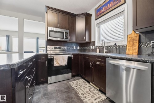 7915 22 Avenue Sw, Edmonton, AB - Indoor Photo Showing Kitchen With Upgraded Kitchen