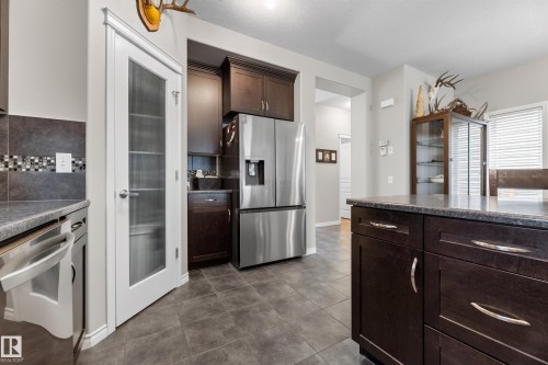 7915 22 Avenue Sw, Edmonton, AB - Indoor Photo Showing Kitchen With Stainless Steel Kitchen