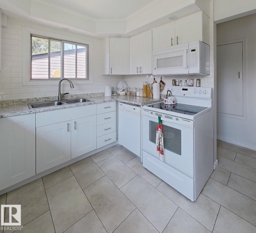 9201 153 Street Nw, Edmonton, AB - Indoor Photo Showing Kitchen With Double Sink