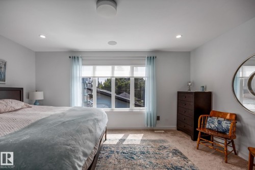 Carpeted room with recessed lighting and a ceiling-mounted fixture - 14221 101 Avenue Nw, Edmonton, AB - Indoor Photo Showing Bedroom