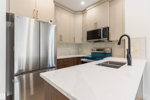 11229 96 Street Nw, Edmonton, AB - Indoor Photo Showing Kitchen With Double Sink With Upgraded Kitchen